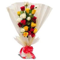 Mix Roses Bouquet in Crepe Wrap 12 Flowers Bhai Dooj Gift to India