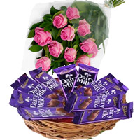 Online Dairy Milk Basket 12 Chocolates With 12 Pink Roses for Bhai Dooj Gift