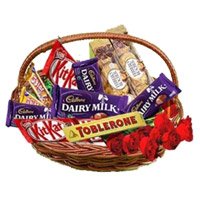 Online Basket of Assorted Chocolate and 10 Red Roses Bhai Dooj Gift delivery in India