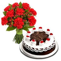 Send 12 Red Carnation 1/2 Kg Black Forest Cake Bhai Dooj gift hamper