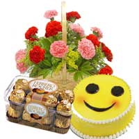 Send Bhai Dooj gift 15 Red Pink Carnation Basket, 16 pcs Ferrero Rocher and 1 Kg Smiley Cake