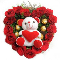 Heart shape combo of 18 Red Roses, 5 Ferrero Rocher, Teddy for Valentine's Day gift to India
