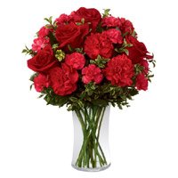Rakhi Flowers to India with Red Roses Red Carnations in Vase for brother