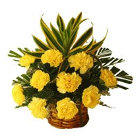 Deliver Rakhi Yellow Carnation Basket 12 Flowers with Rakhi to India