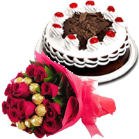 Arrangement of cake, red roses and Ferrero Rocher for Bhai dooj gift online