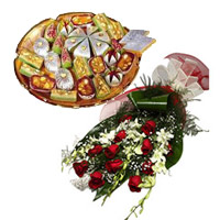 Rakhi Gifts hamper White Orchids, Red Roses, Kaju Sweets with Rakhi