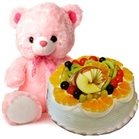 Deliver Rakhi to India including 12 Inch Teddy with 1 Kg Eggless Fruit Cake 5 Star Bakery