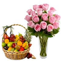 12 Pink Roses in Vase with 1 Kg Fresh Fruits Basket to India