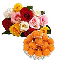 Rakhi sweets with flowers Bouquet in India