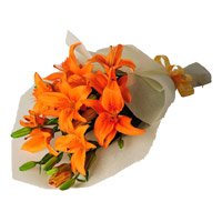 Send Online Orange Lily Bouquet with Rakhi
