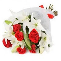 Get Rakhi and White Lily Red Roses Bouquet