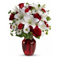 2 White Lily 6 White Gerbera 6 Red Roses Vase and Rakhi Delivery to India