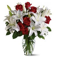 4 White Lily 12 Red Roses Vase with 2 Free Rakhi to India