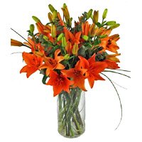 Rakhi and Orange Lily Vase Flowers delivery in India for brother