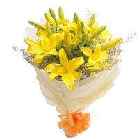 Online Yellow Lily Bouquet Flowers with Rakhi