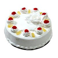 Same Day Pineapple Cake with 2 Free Rakhi Delivery in India
