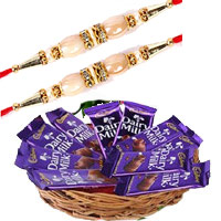 Place Order for Rakhi and Dairy Milk Basket 12 Chocolates With 12 Pink Roses in India